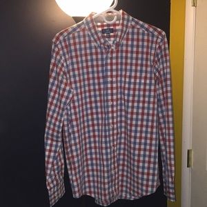 Long-sleeved button down shirt.